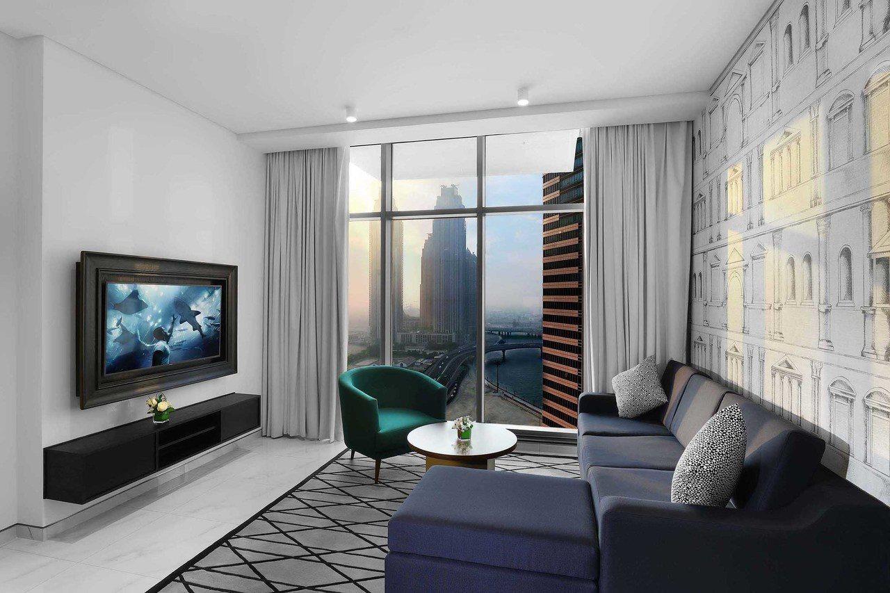 มิลเลนเนียม เอเตรีย บิสซิเนส เบย์ Aparthotel ดูไบ ภายนอก รูปภาพ A living room in a typical apartment