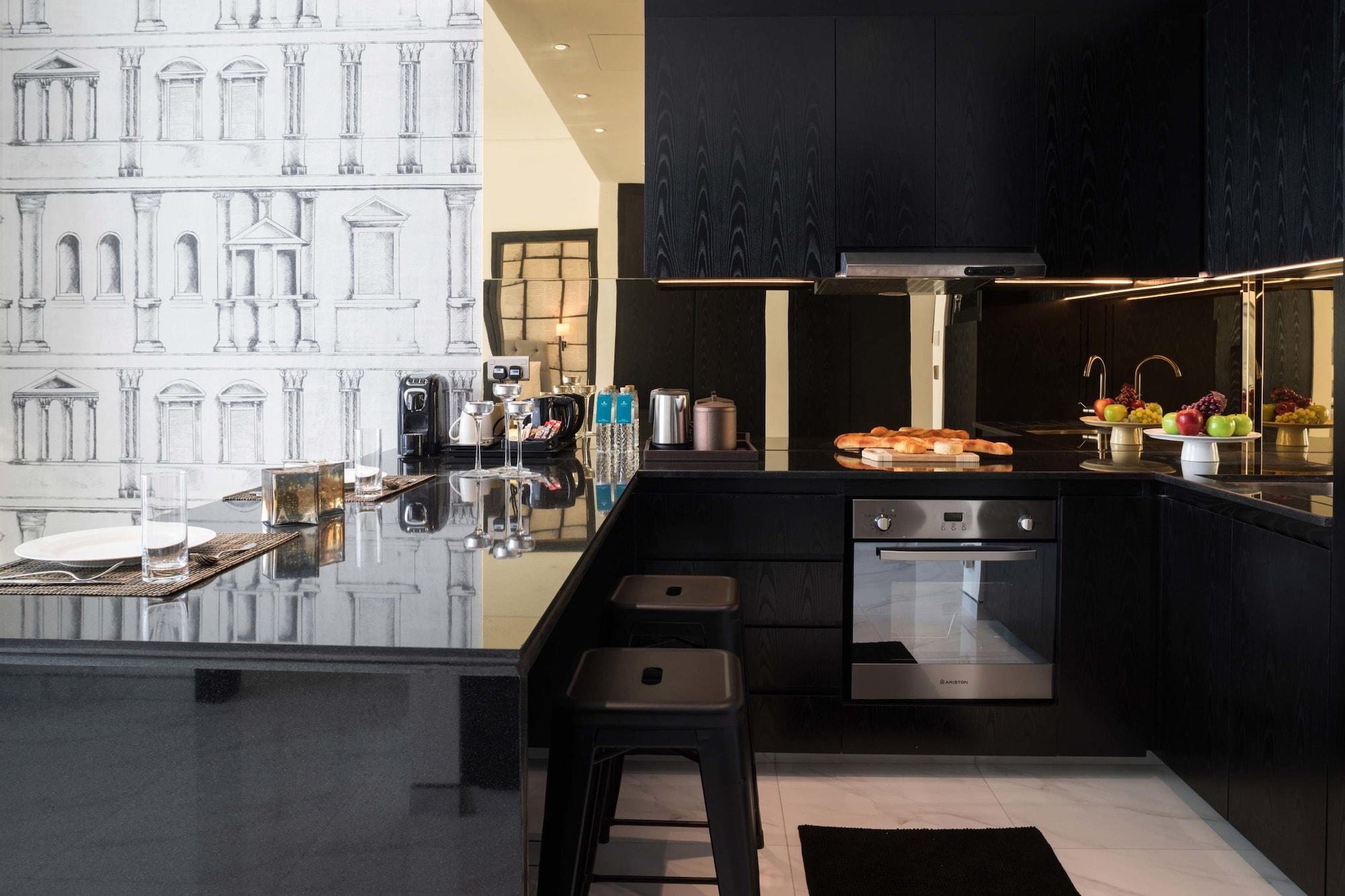 มิลเลนเนียม เอเตรีย บิสซิเนส เบย์ Aparthotel ดูไบ ภายนอก รูปภาพ A kitchen in a private home